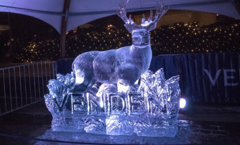 white lighted deer ice sculpture